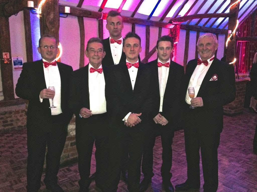 2013 awards evening with the team from Marquee Hertford dressed in black tie with pink bowties