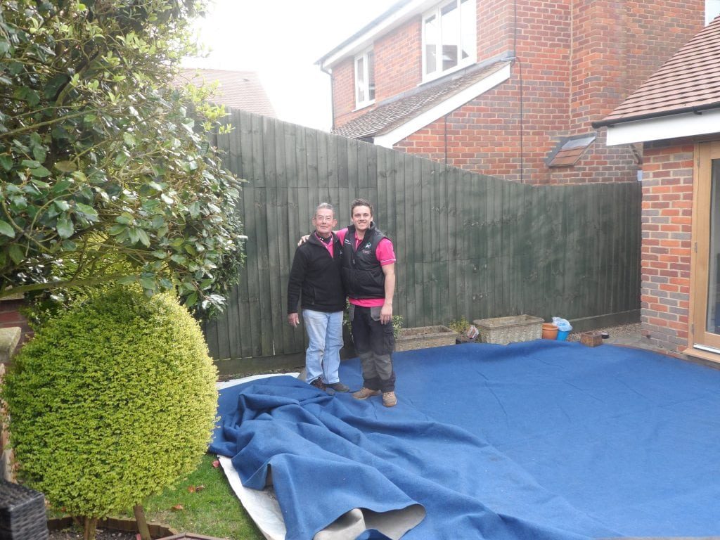 Mark Hammond on site setting up a marquee with the team